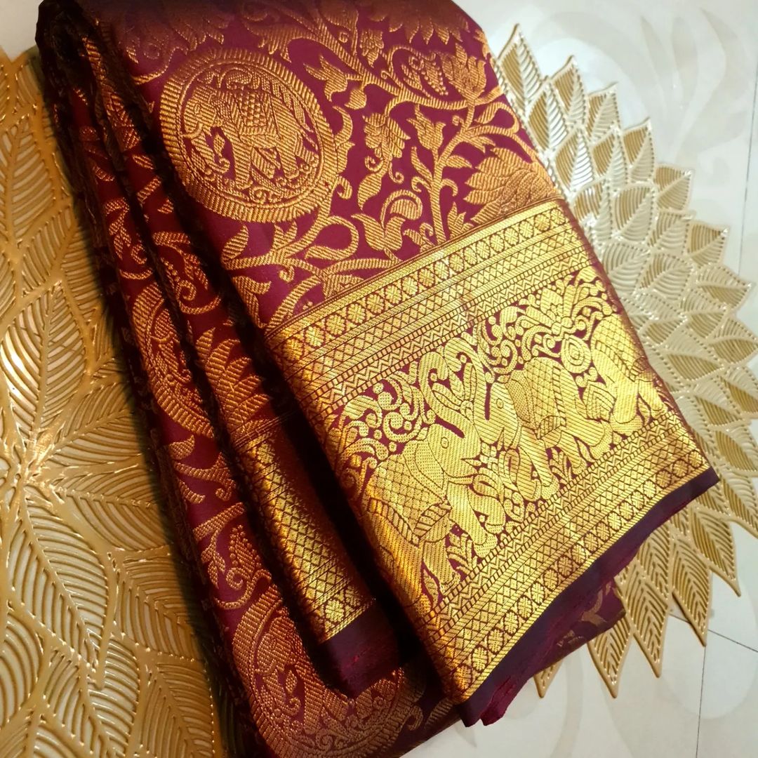 Lovely Wine Soft Banarasi Silk Saree With Precious Blouse Piece