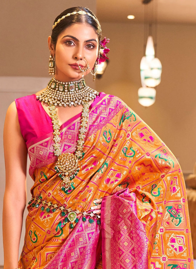 Lovely Orange Patola Silk Saree with Sensational Blouse Piece