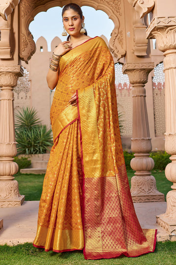 Unique Orange Patola Silk Saree with Appealing Blouse Piece