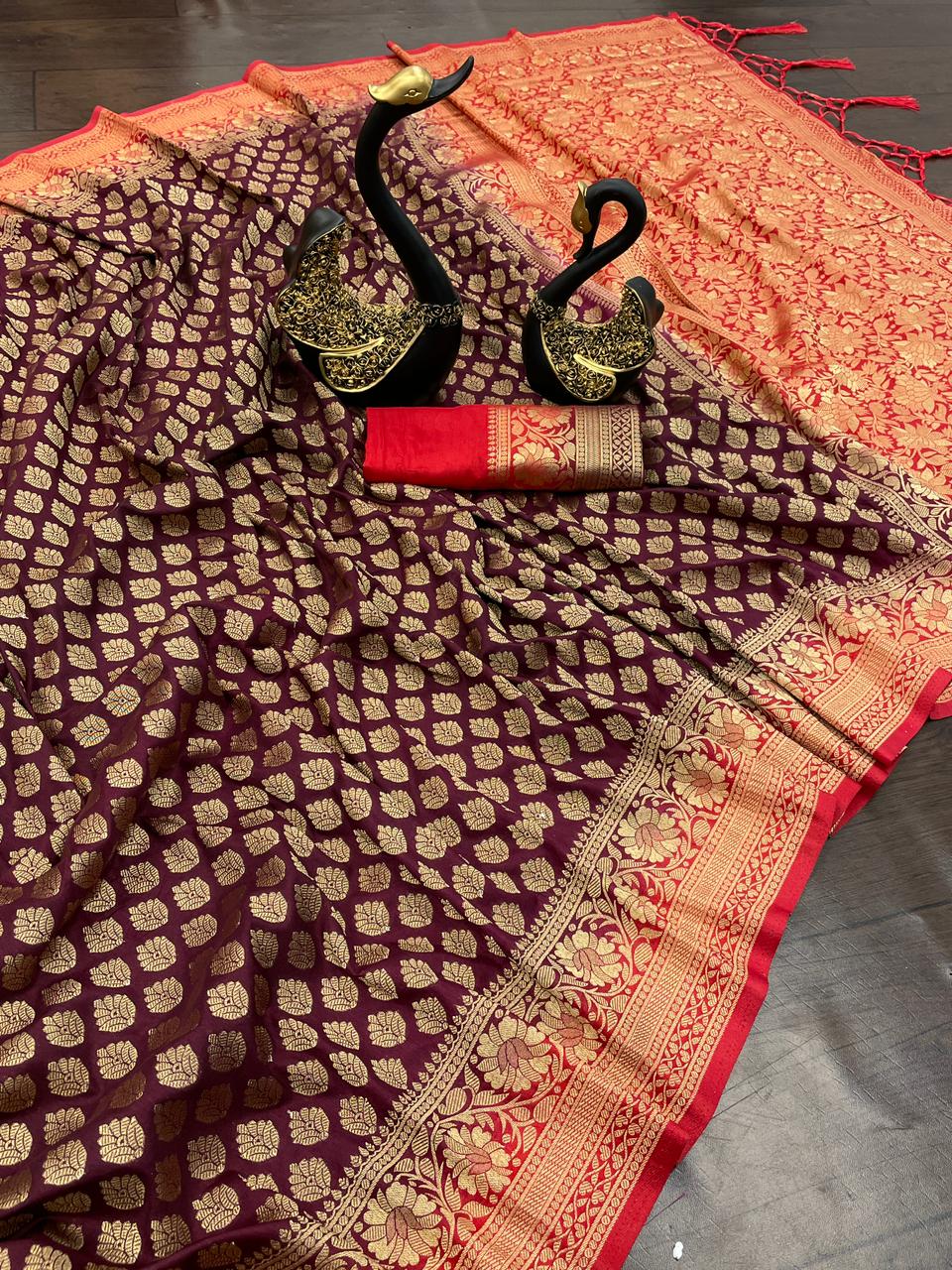 Embrocation Wine Soft Banarasi Silk Saree With Lassitude Blouse Piece