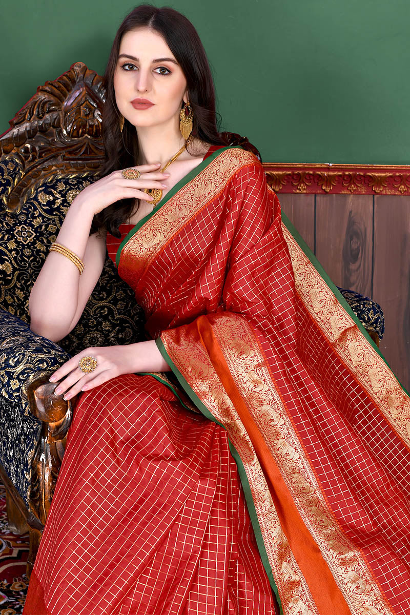 Bewitching Red Soft Banarasi Silk Saree With Demure Blouse Piece