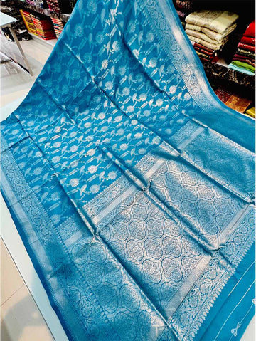 Trendy Firozi Soft Banarasi Silk Saree With Marvellous Blouse