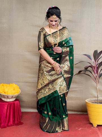 Prettiest Dark Green Banarasi Silk Saree With Assemblage Blouse Piece