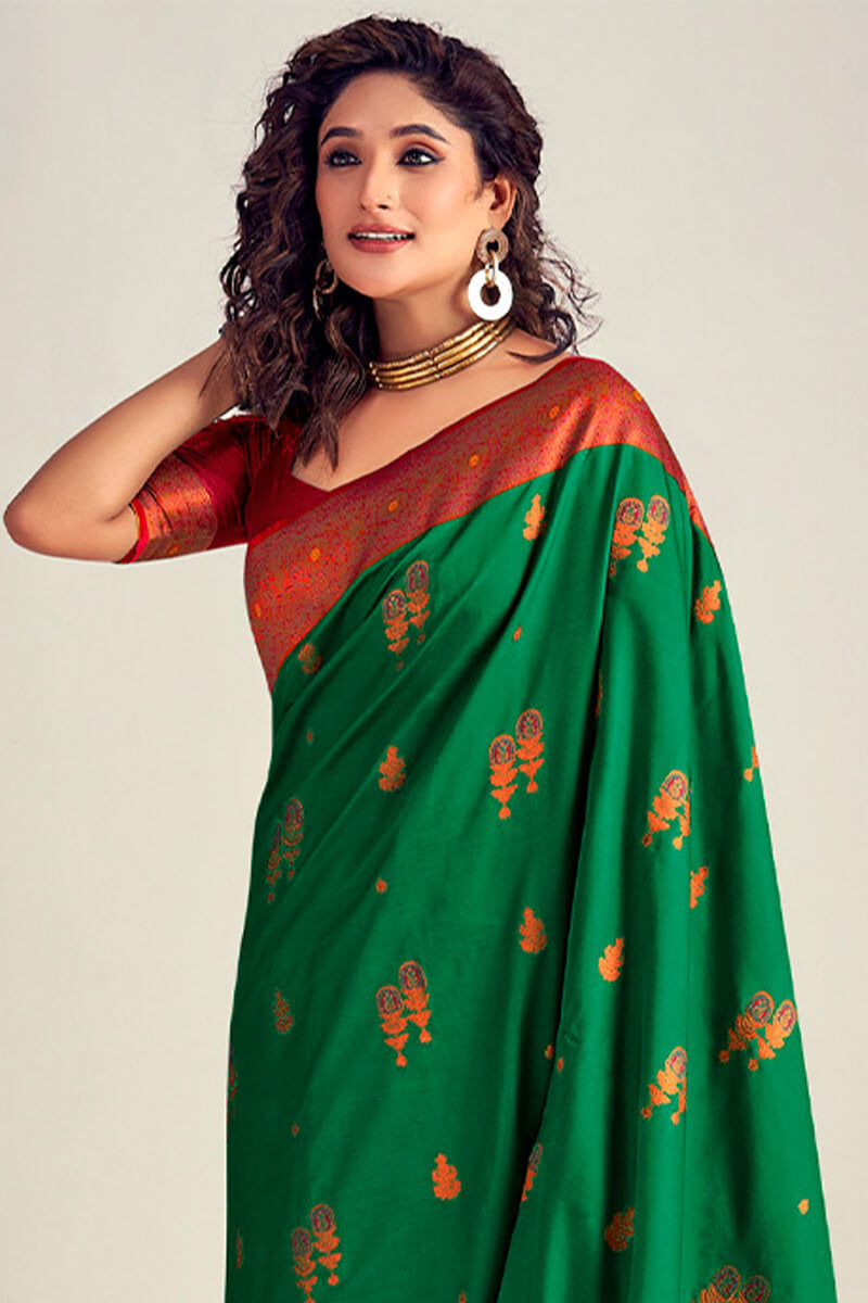 Lassitude Dark Green Soft Banarasi Silk Saree With Redolent Blouse Piece