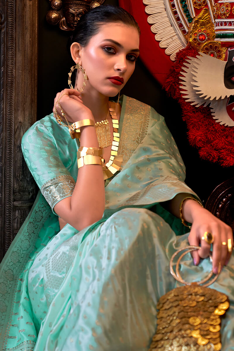 Radiant Sea Green Banarasi Satin Silk Saree With Alluring Blouse