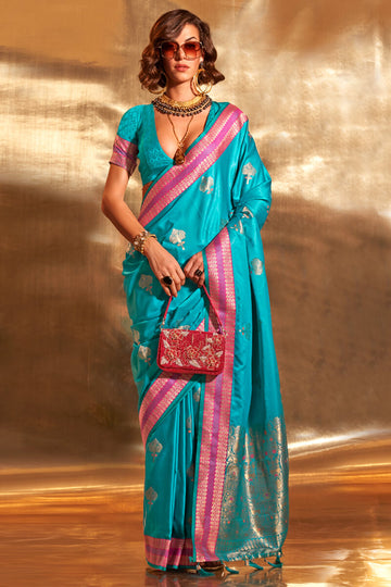 Glowing Firozi Soft Banarasi Silk Saree With Eye-catching Blouse