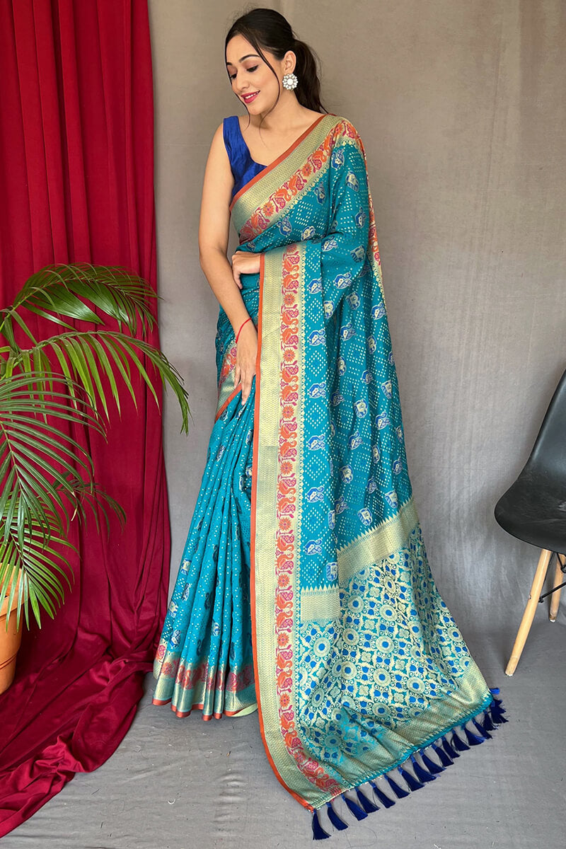 Demanding Firozi Patola Silk Saree with Desiring Blouse Piece